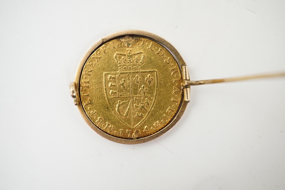 British gold coins, George III, gold guinea, 1794, in a swivel mount, plug at 12 o’clock position, otherwise good